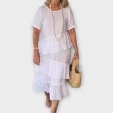 Elegantní Šaty S Ženskými Náznaky A Volným Střihem