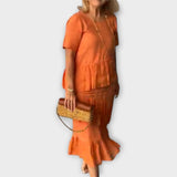 Elegantní Šaty S Ženskými Náznaky A Volným Střihem